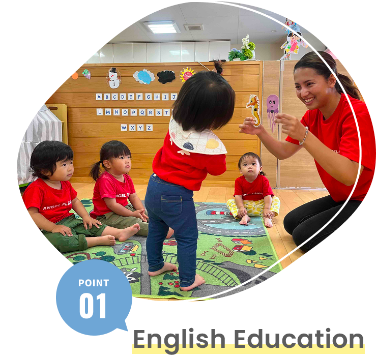Children learning English through fun play activities with a teacher at the nursery