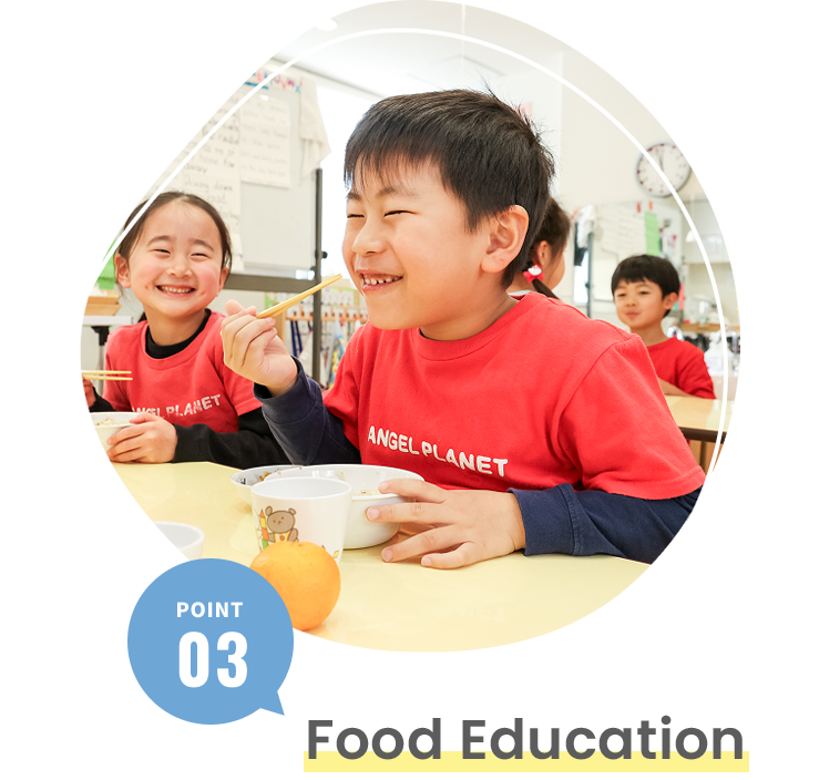 Children enjoying a healthy meal together and learning about food at the nursery